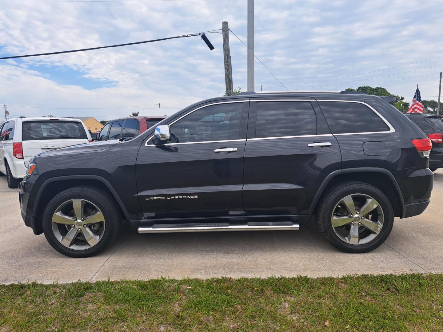 2014 Grey Jeep Grand Cherokee (1C4RJEBG6EC) , located at 1181 Aurora Rd, Melbourne, FL, 32935, (321) 241-1100, 28.132914, -80.639175 - Photo#0